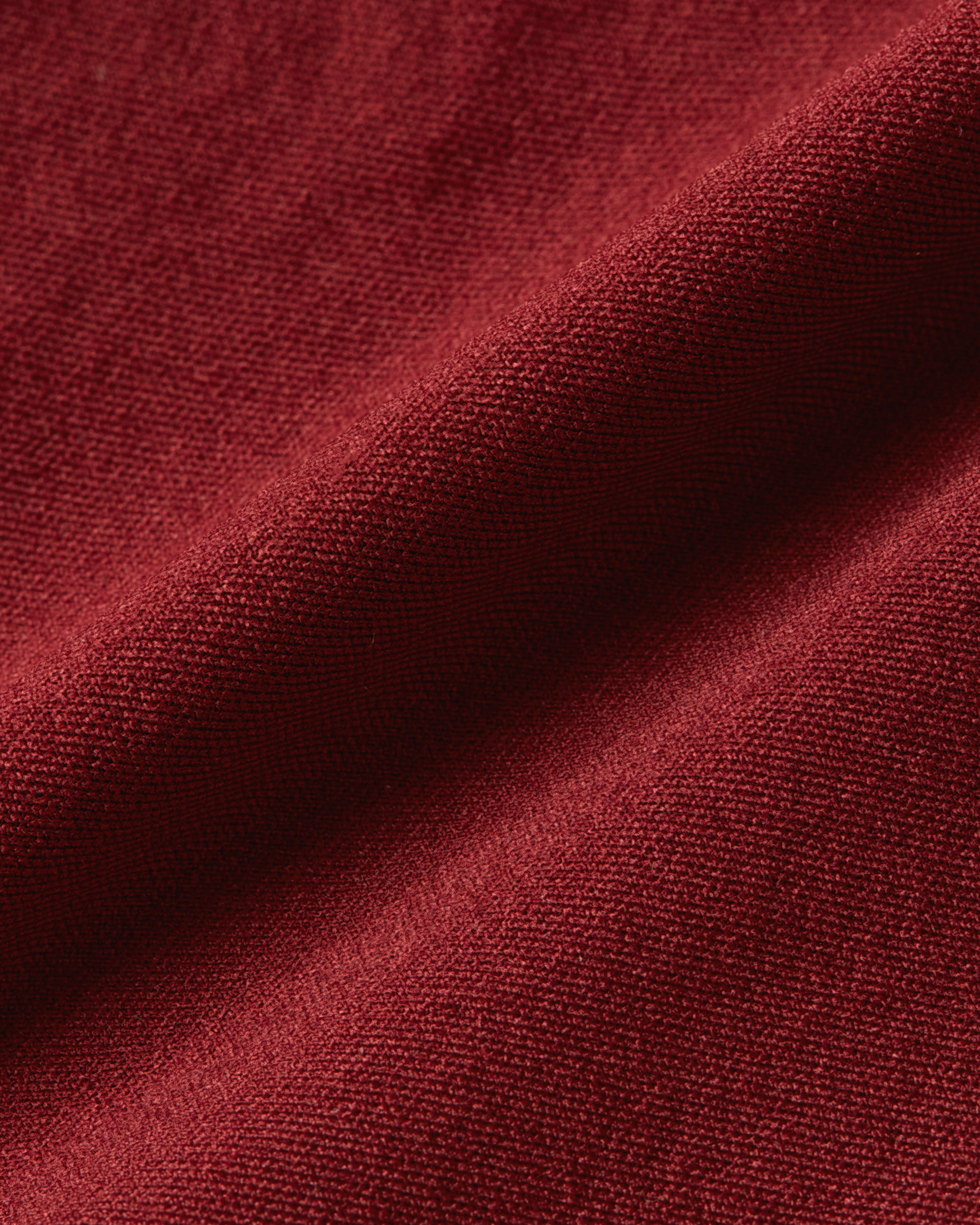 Detail product image of bordeaux shapewear bodysuit showing a smooth and firm fabric with a sculpting texture and supportive stretch