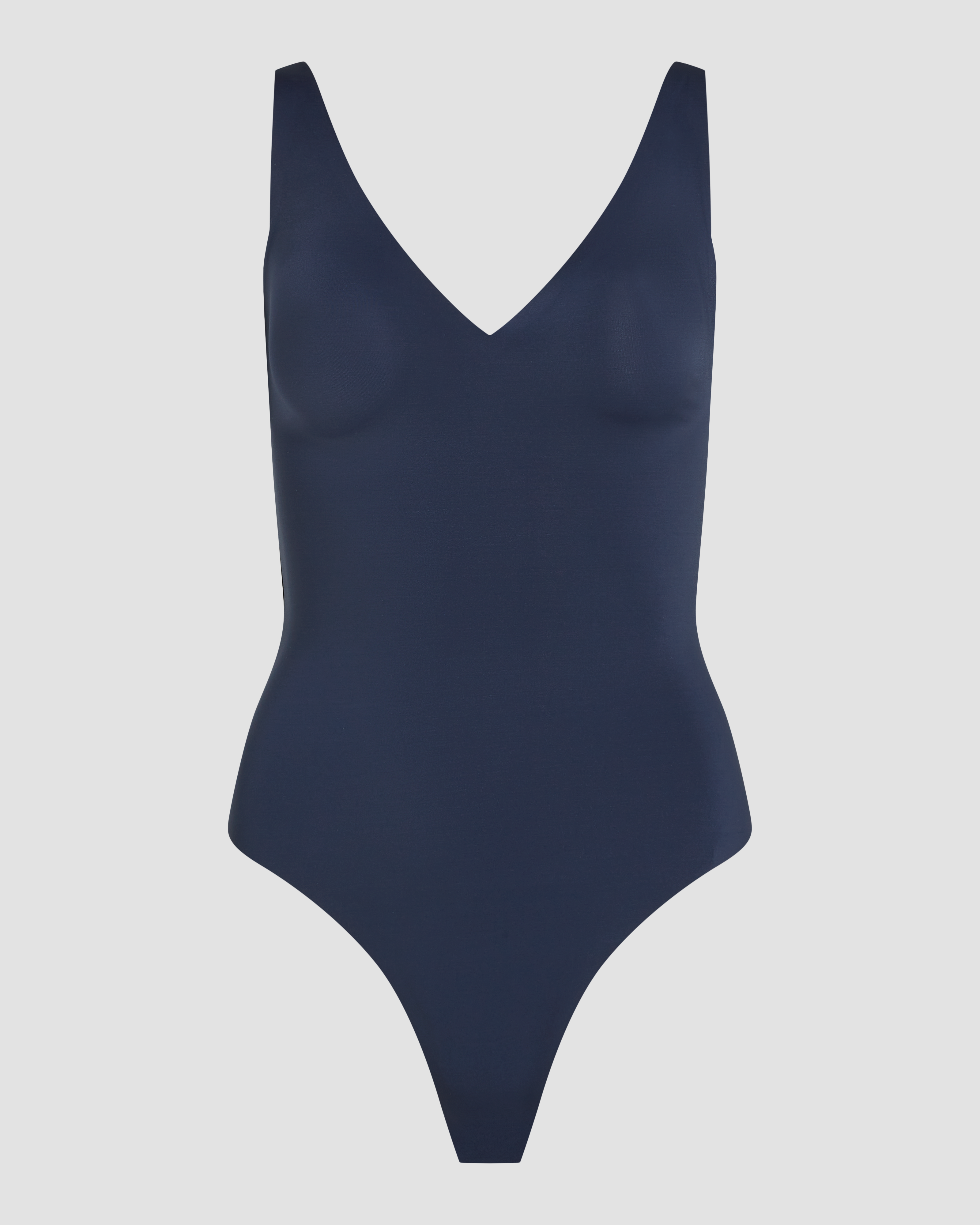Dark blue laserwear bodysuit thong product photo with seamless edges and invisible finish