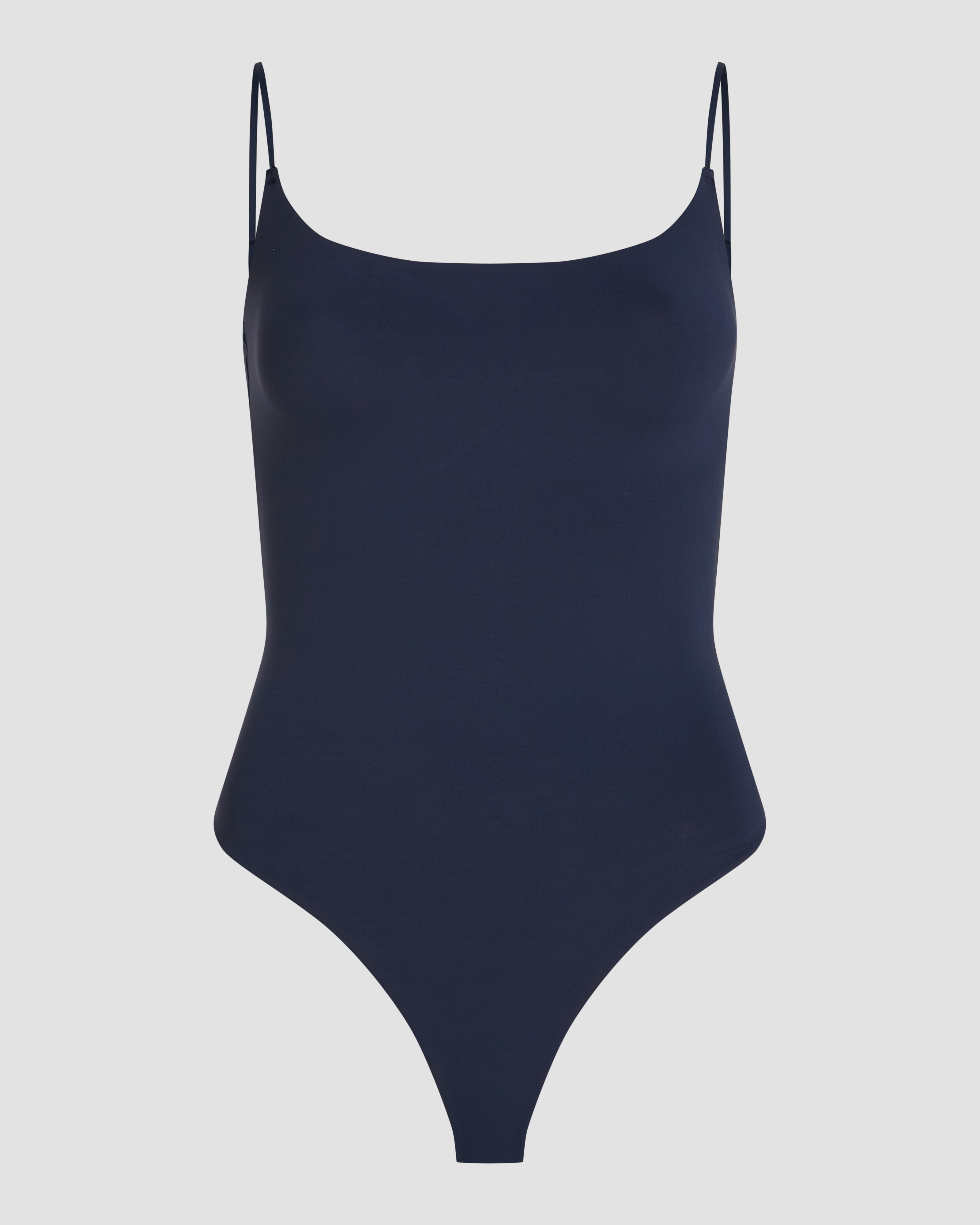 Dark blue seamless bodysuit product photo with spaghetti straps and invisible finish under clothing