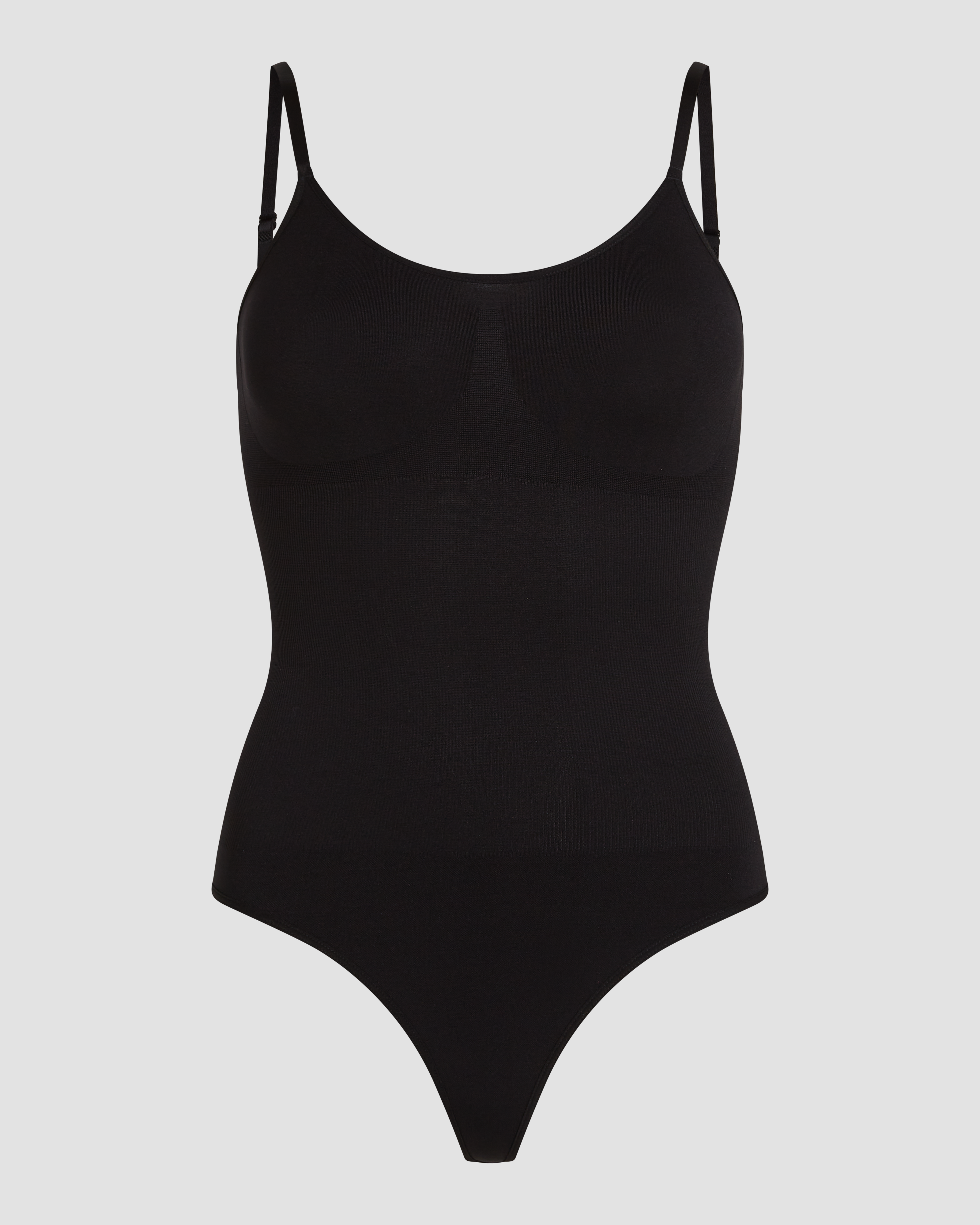 Black rib shapewear bodysuit thong product photo with smoothing effect and sculpted fit