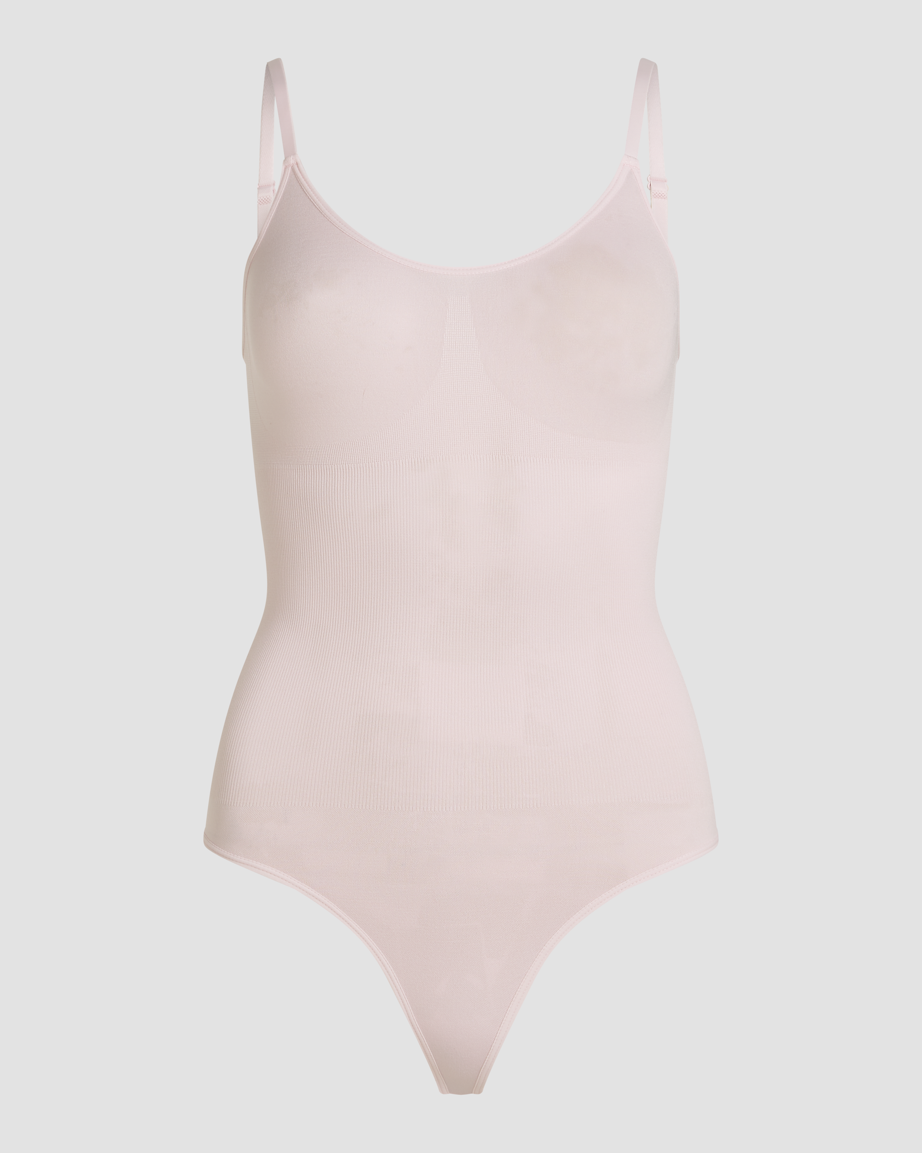 Pink ribbed shapewear bodysuit thong product photo with thong fit and smooth finish