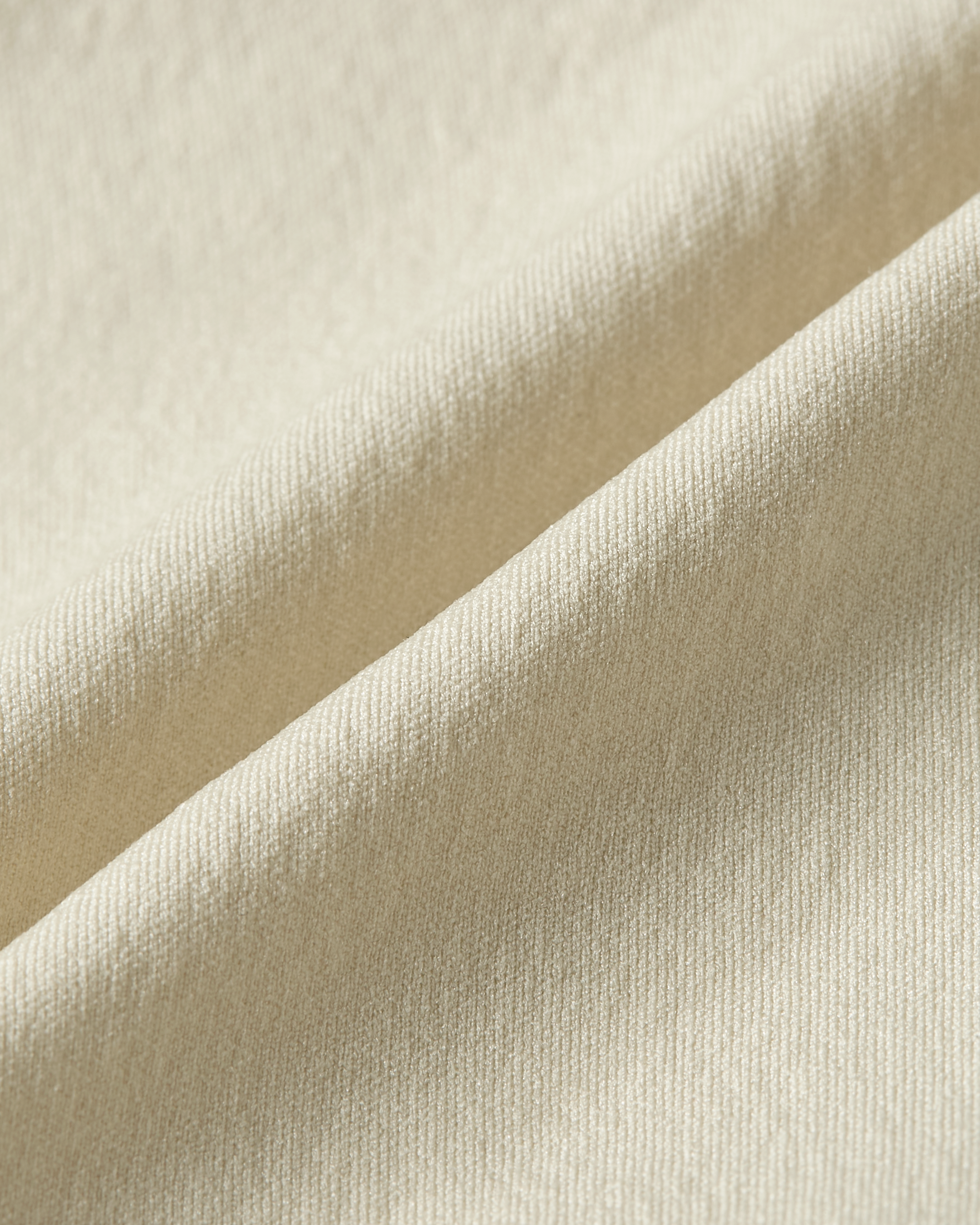 Close up of beige shaping bralette highlighting flexible compression material with a light and natural feel product image