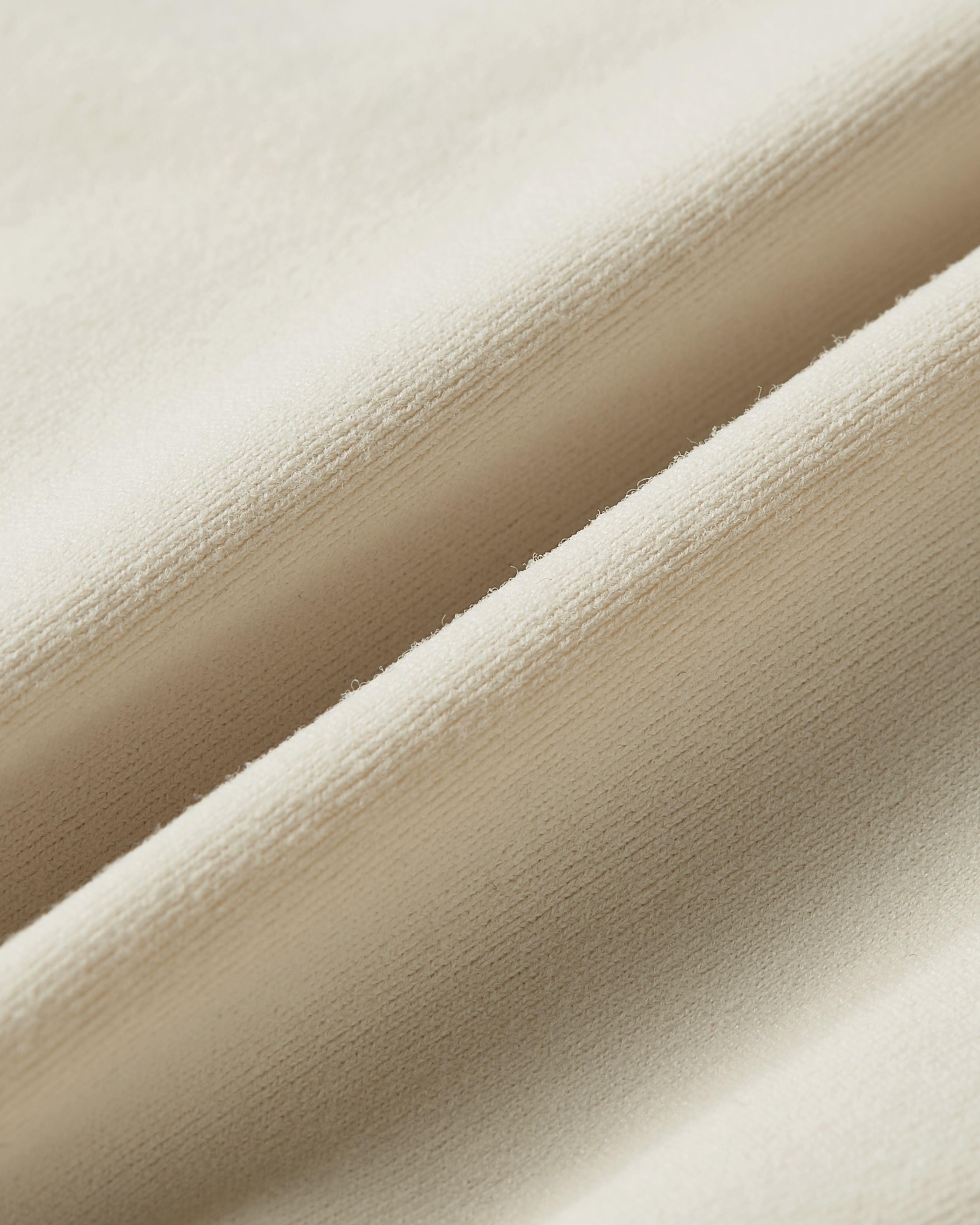 Detail product image of beige soft skin bralette showing ultra soft fabric with a smooth second skin texture and seamless finish