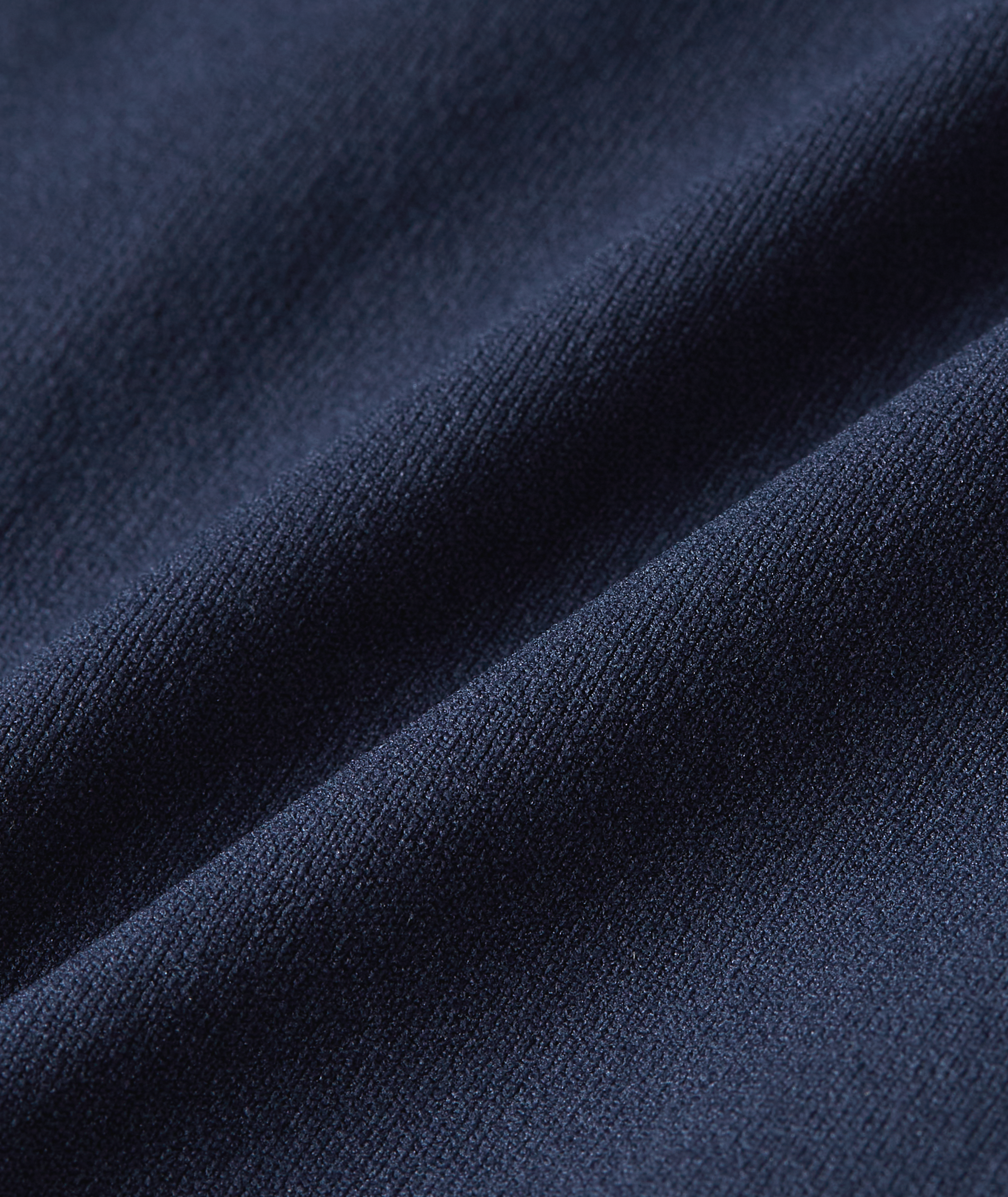 Detail product image of dark blue brazilian underwear showing a smooth fabric surface with a deep tone and a soft, even texture