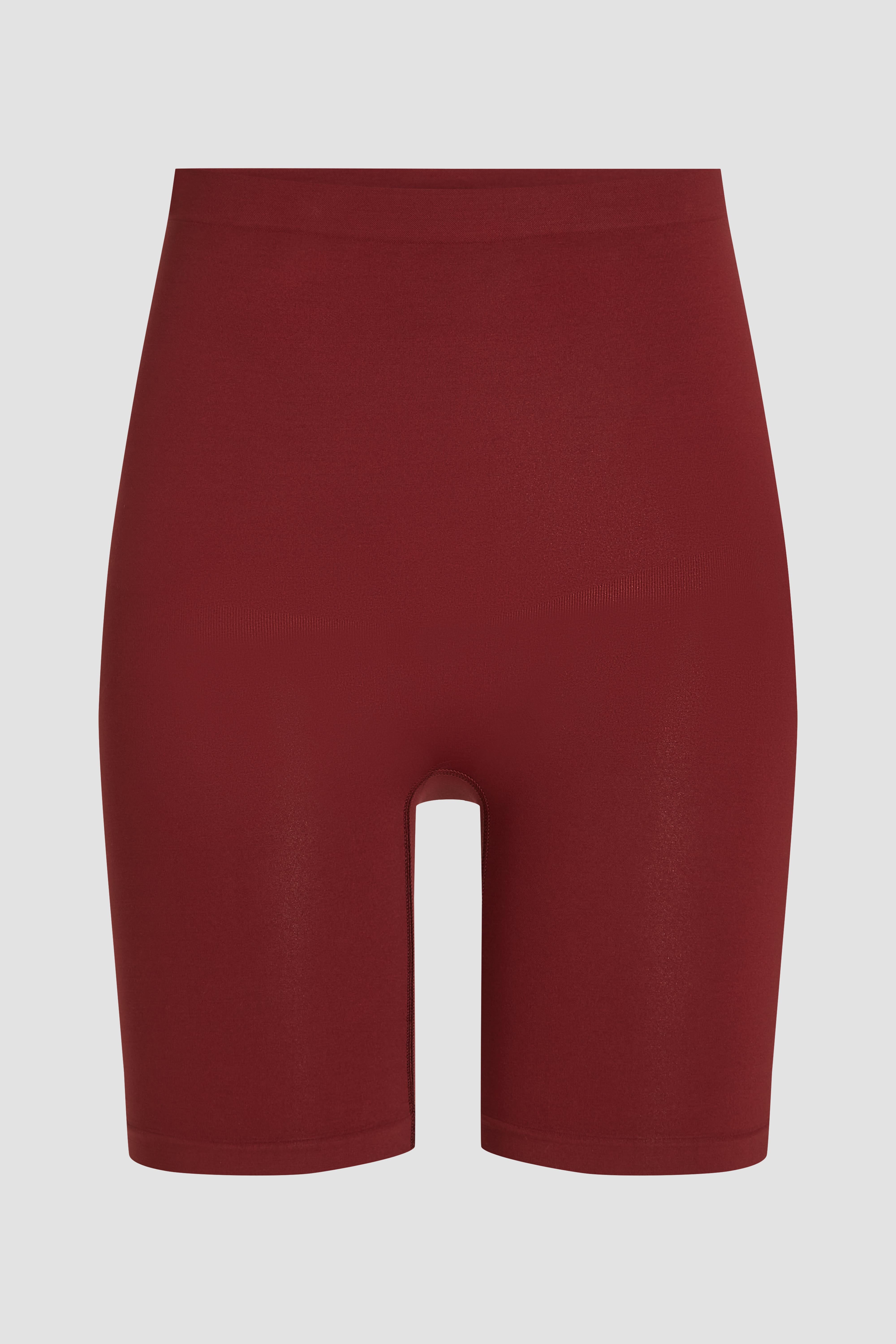 Bordeaux shapewear short product photo with strong tummy and thigh shaping and seamless fit