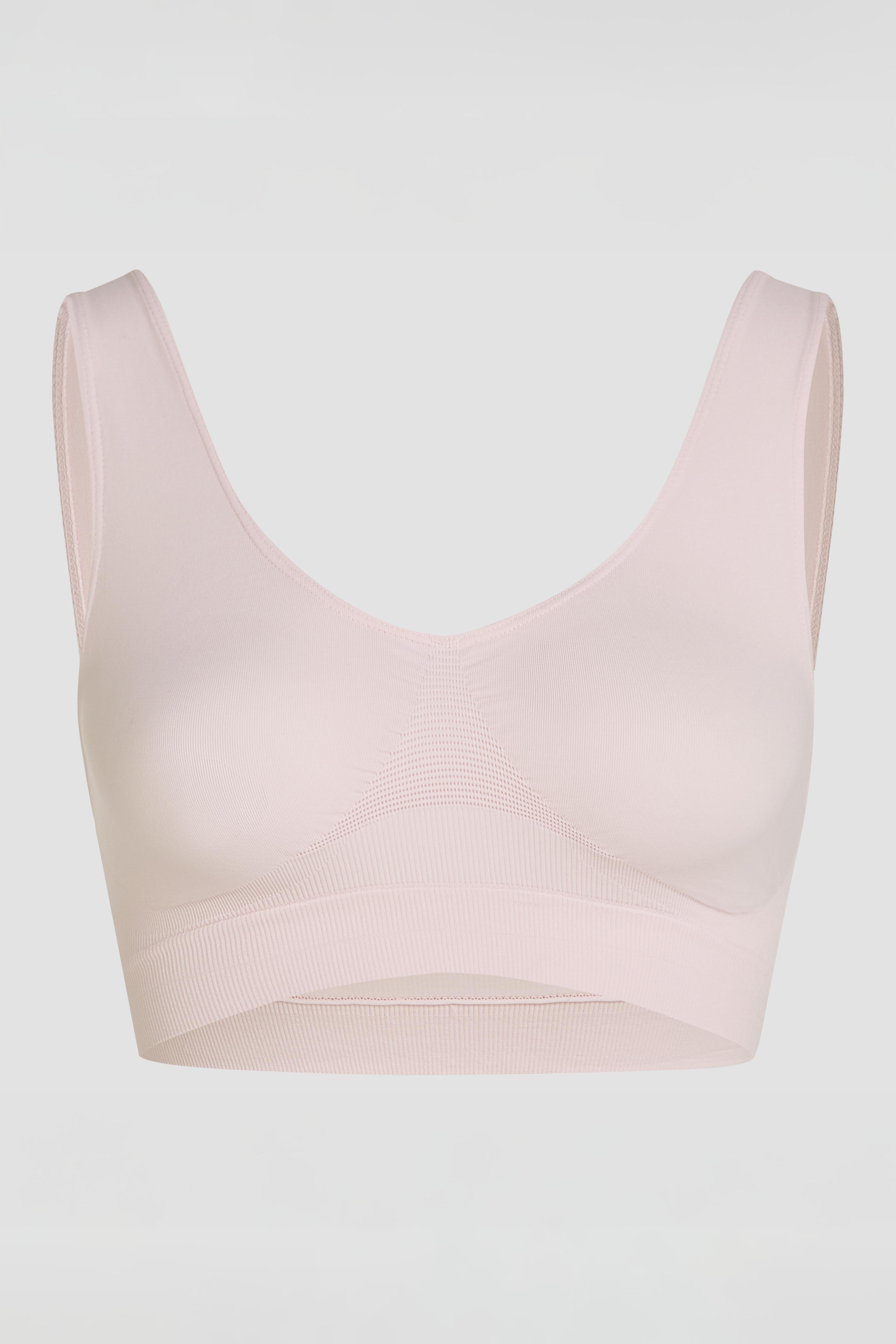 Essentials pink tank bra product image, soft breathable fabric and seamless design