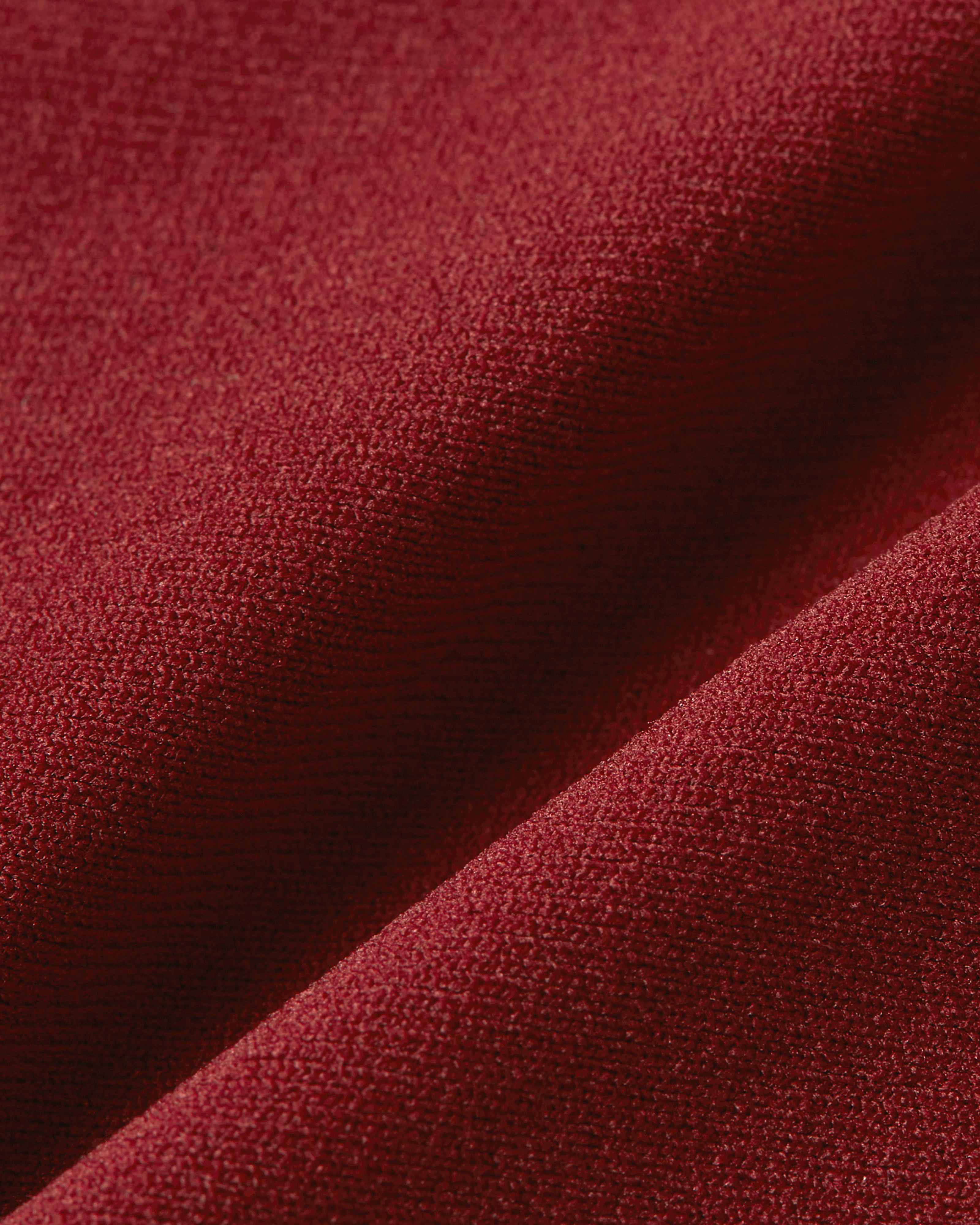 Detail product image of bordeaux seamless thong fabric showing a smooth surface with a rich tone and a soft, refined texture