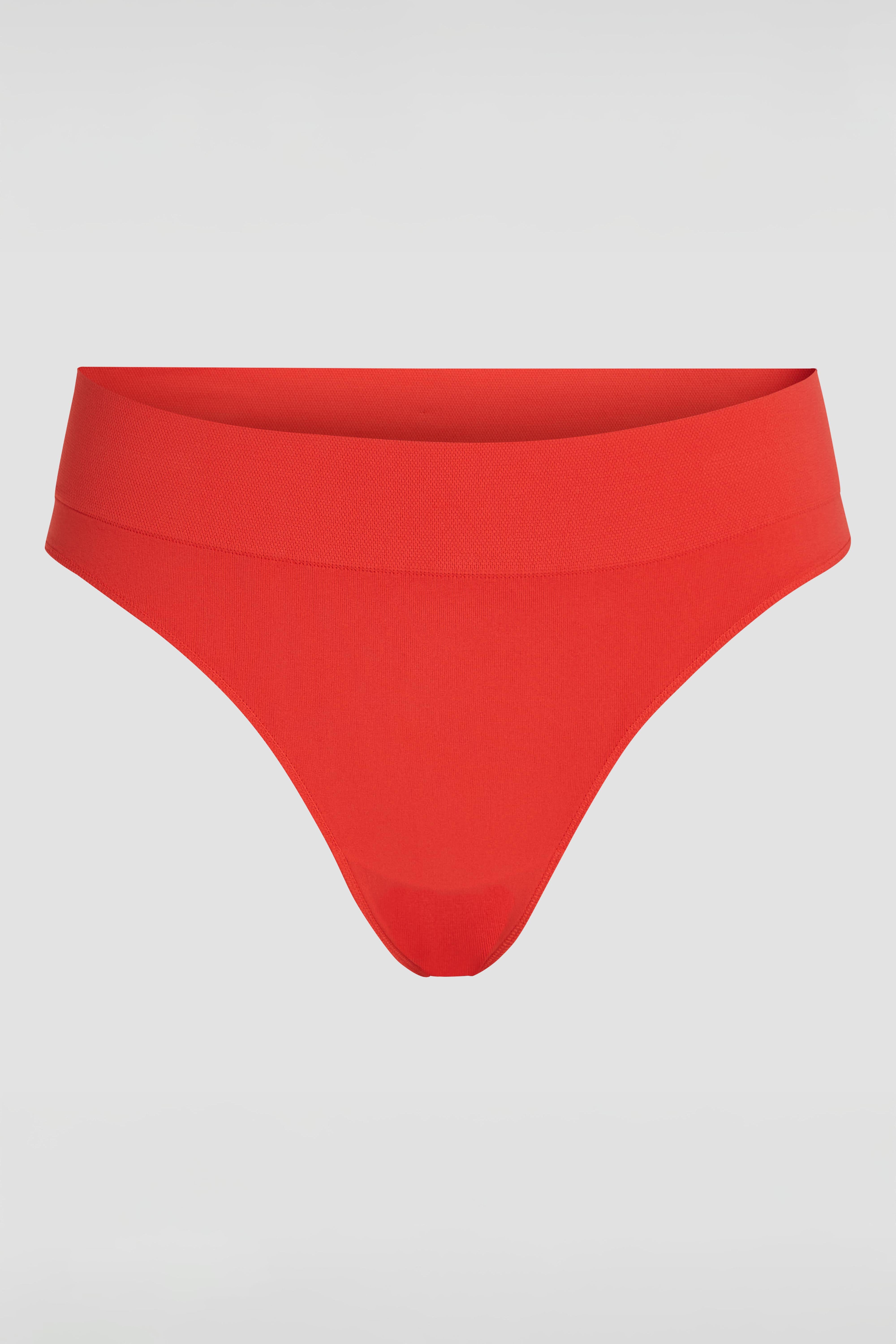 Red seamless thong underwear with smooth invisible finish under clothing