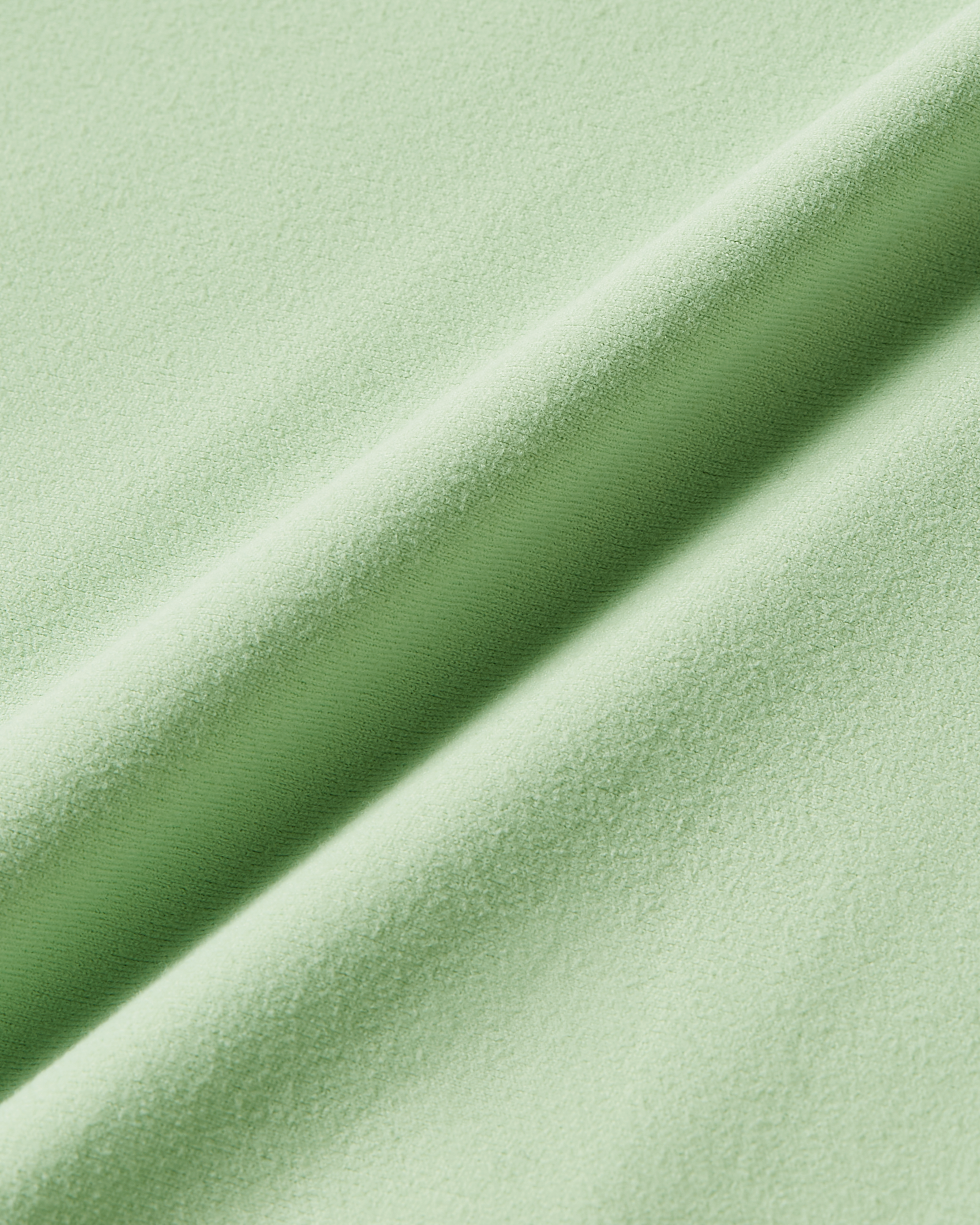 Matcha fabric detail image showing lightweight material and soft second skin feel