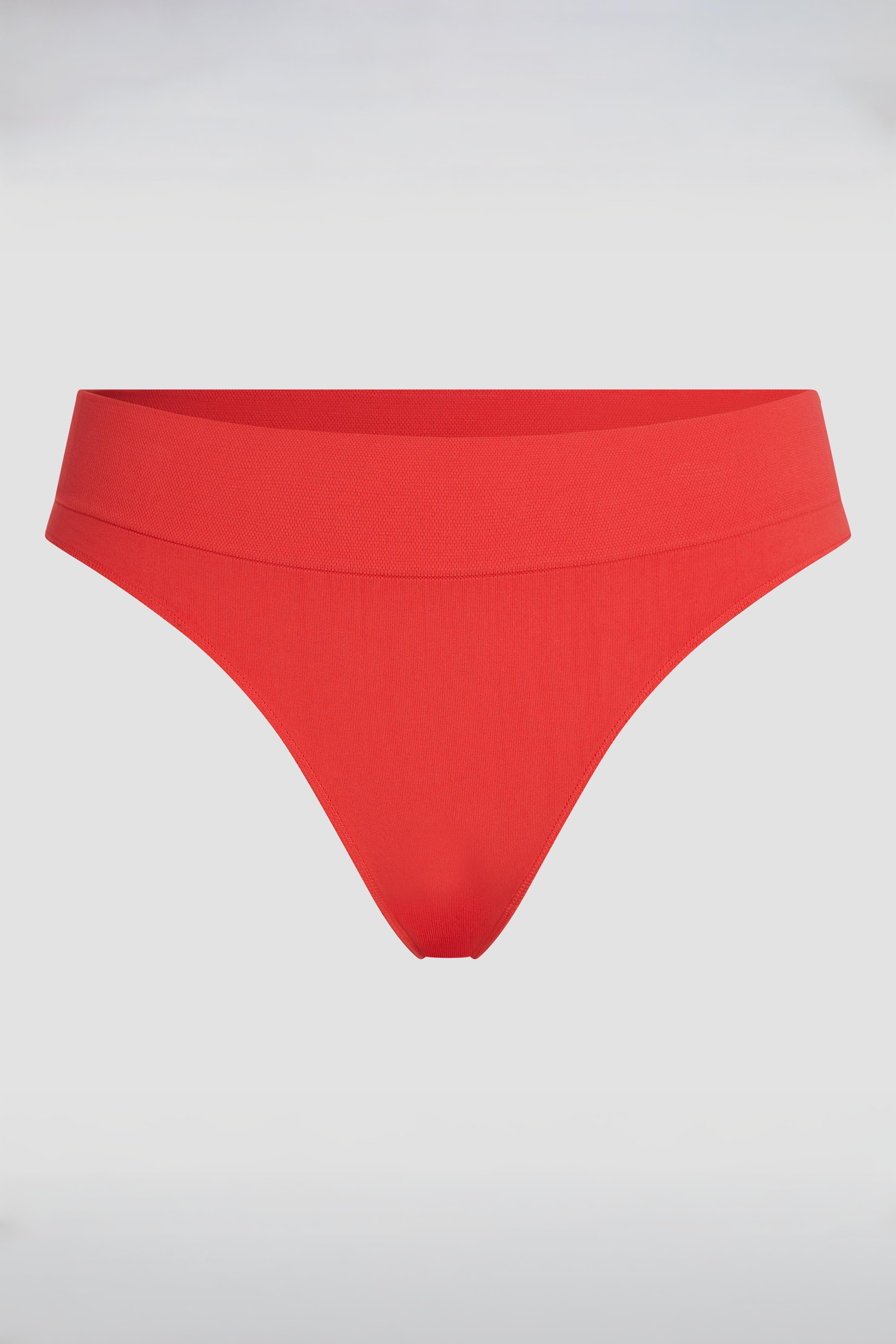 Red seamless brazilian product photo with flattering fit and invisible finish under clothing