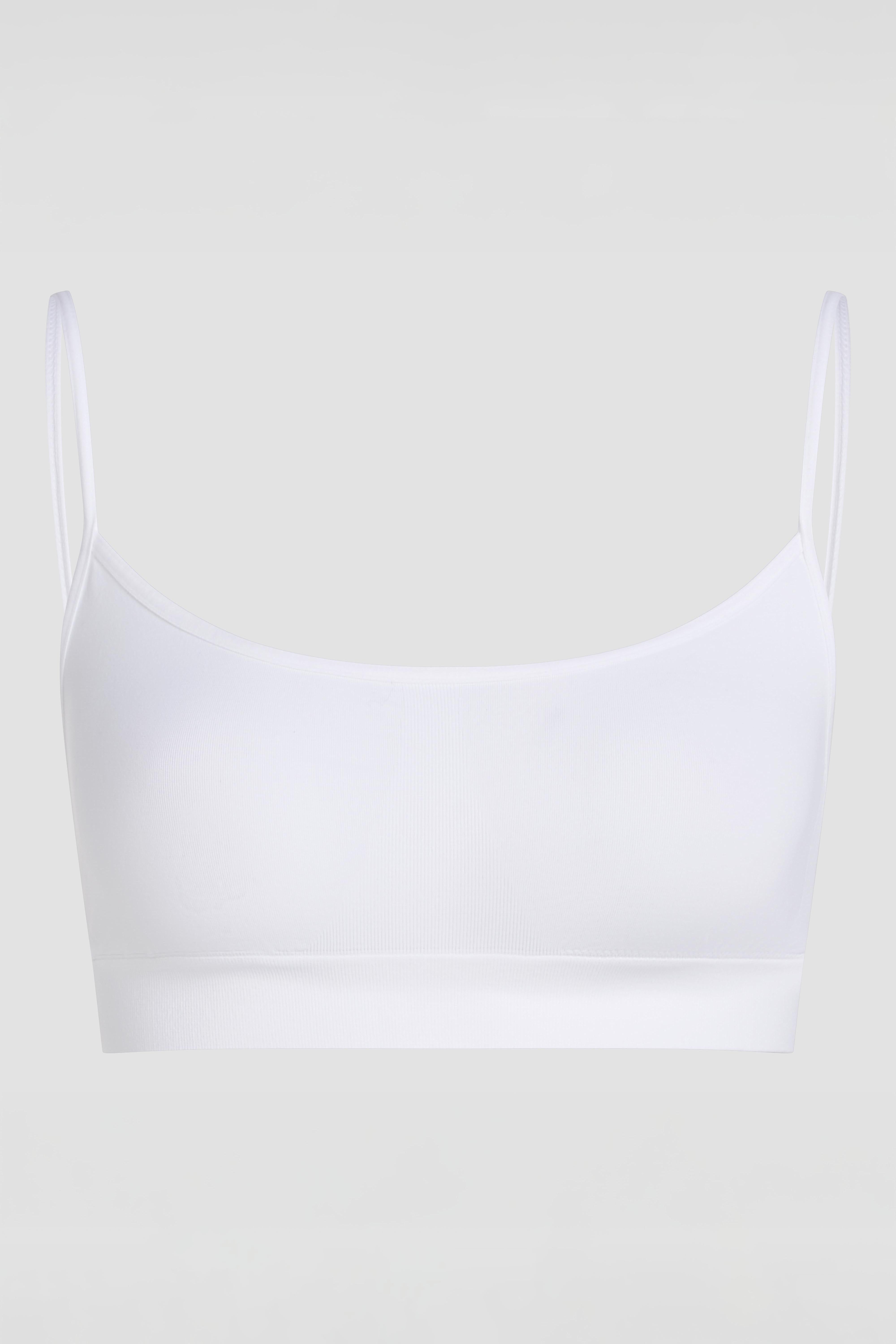 White seamless bralette product image with scoop neckline and minimal design