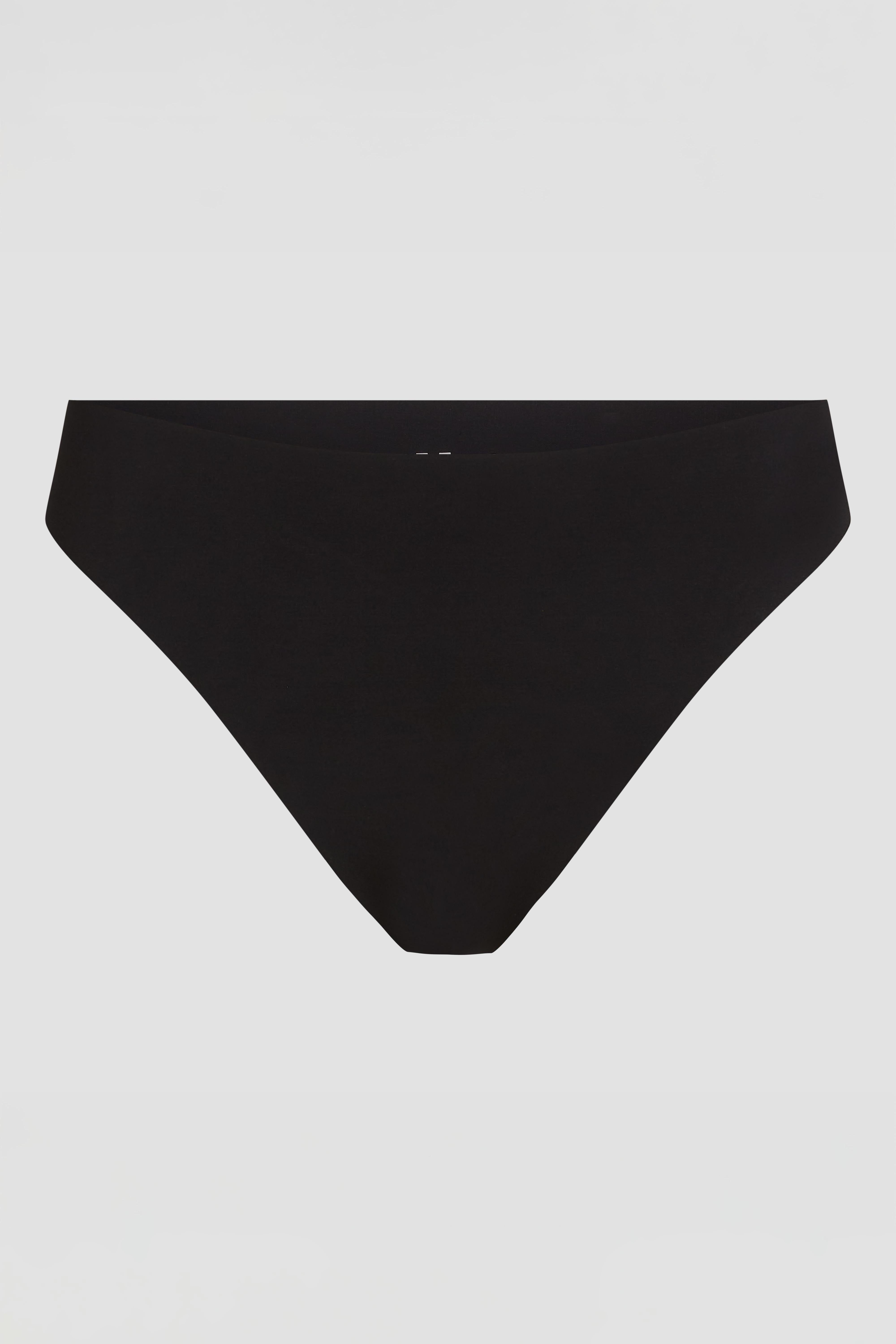 Close-up product photo of black laser cut thong with smooth edge finish