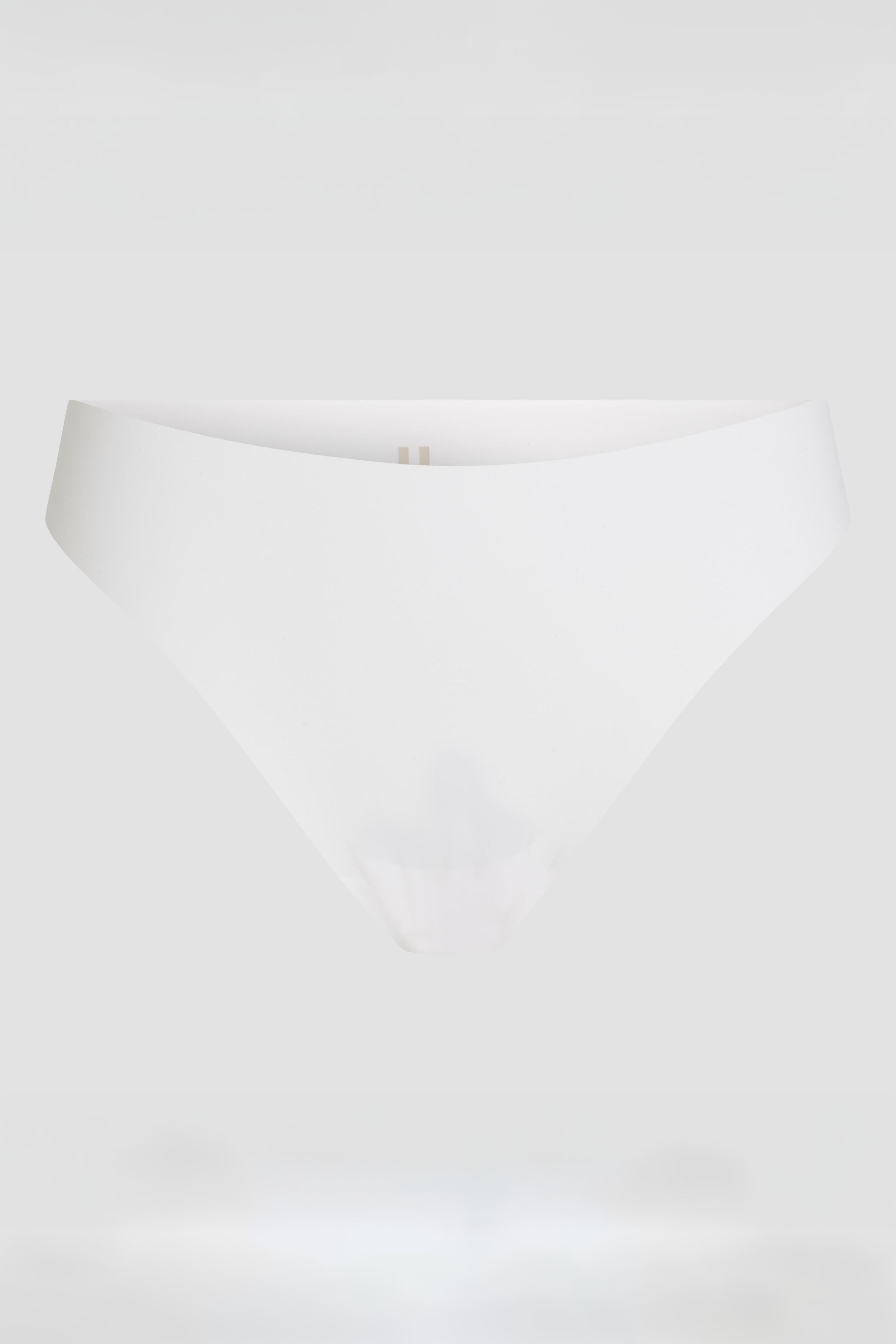 White thong product image with laser cut edges and clean minimal silhouette