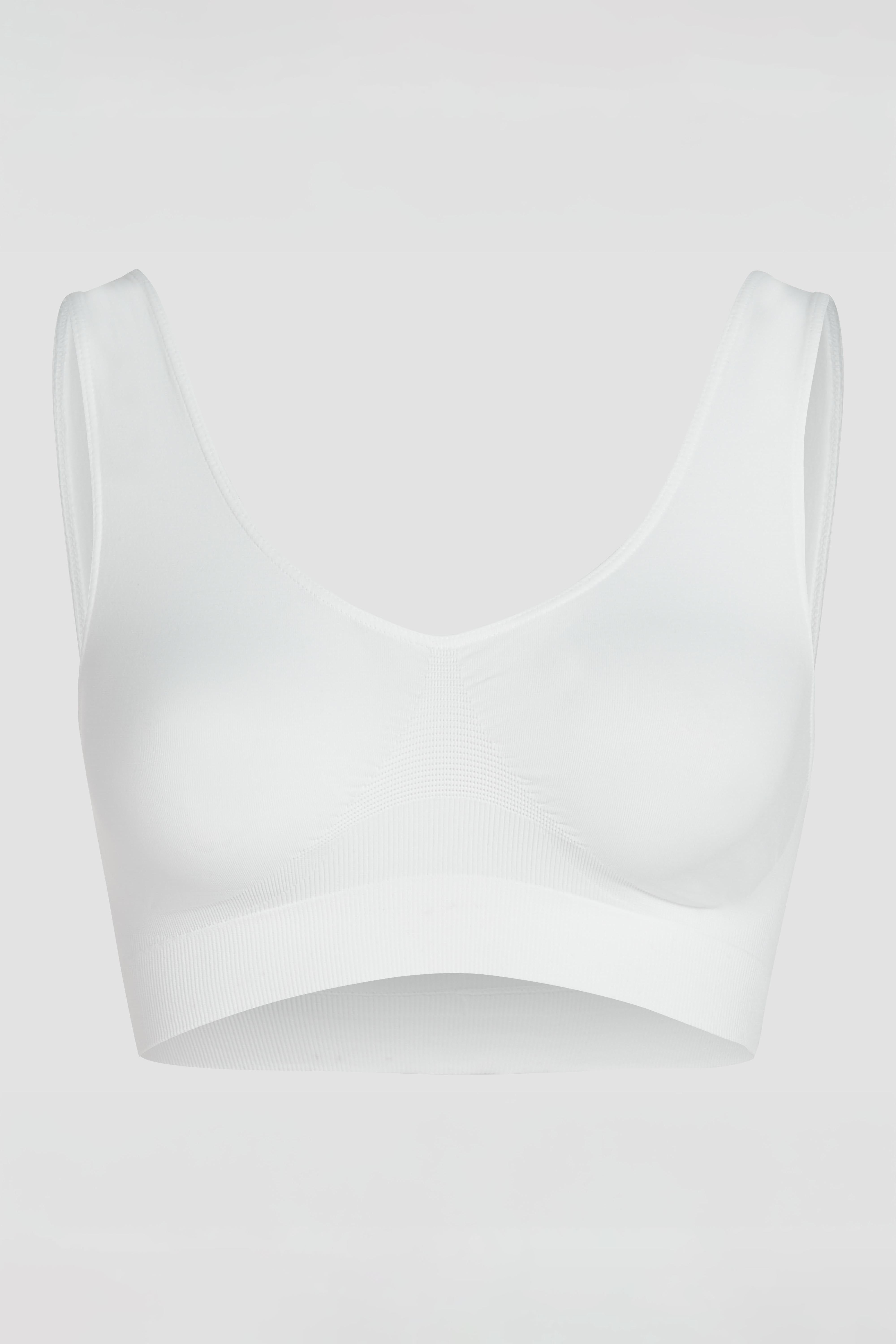 White tank bra product photo with light support and smooth invisible finish